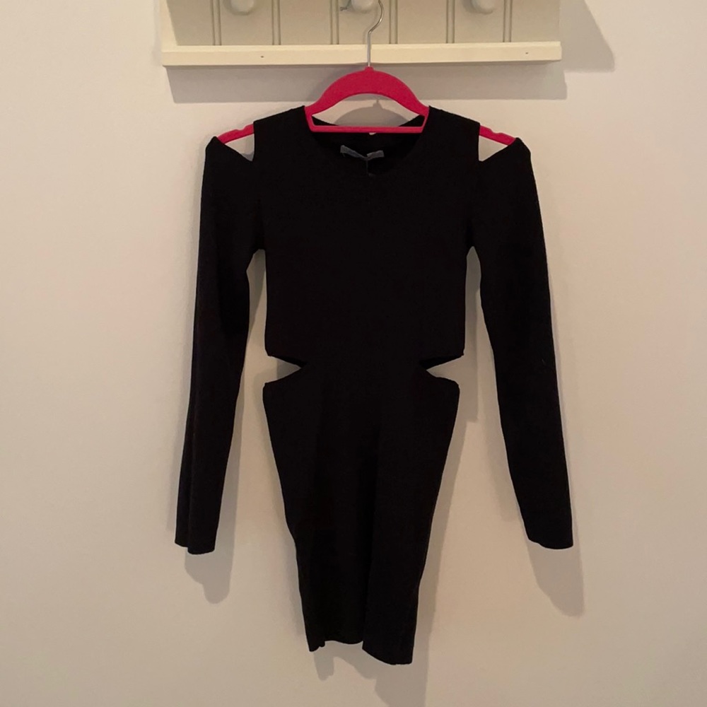 Camar cut out dress. Size small. Never been worn